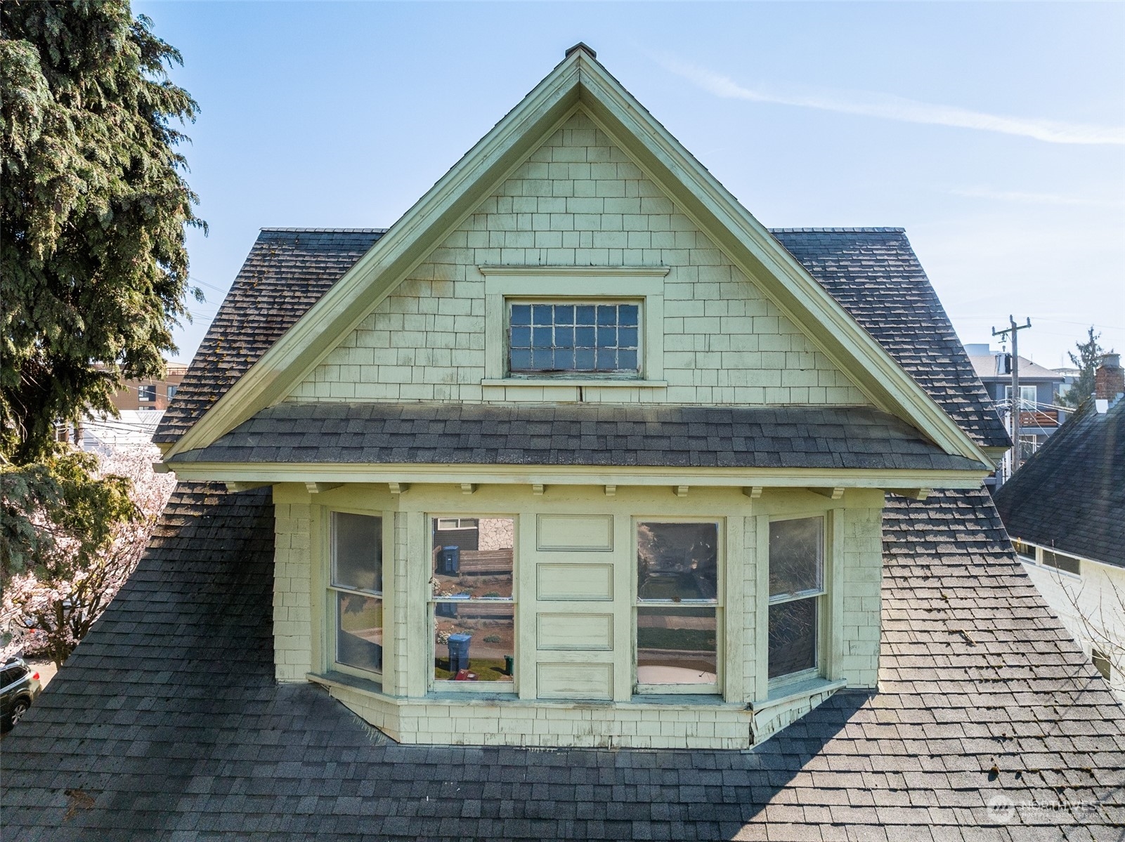 3840 Linden Avenue North Seattle, WA 98103 - Photo 36 of 40 a view of brick house with large windows