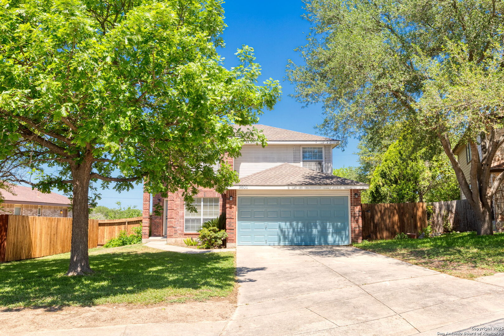 3601 Diamond Falls Schertz, TX 78154 - Photo 1 of 1 a front view of a house with a yard and garage
