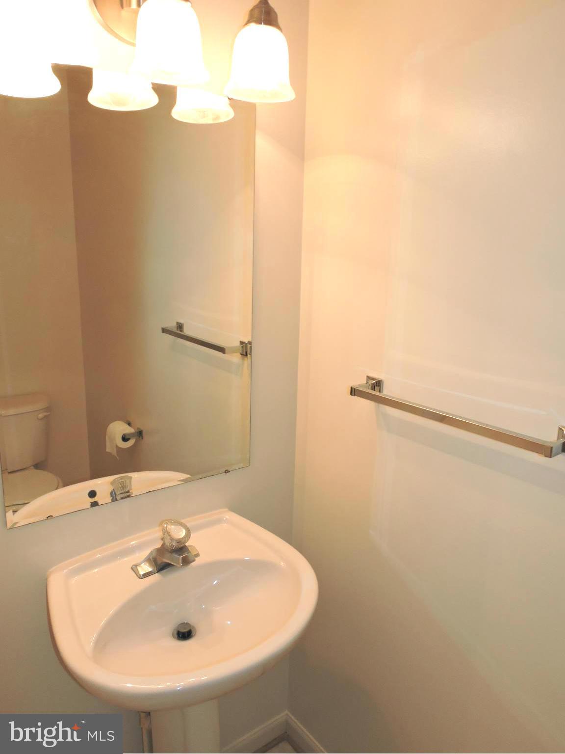 132 Ranson Estates Circle Ranson, WV 25438 - Photo 11 of 30 Convenient half bath nearby w/pedestal sink