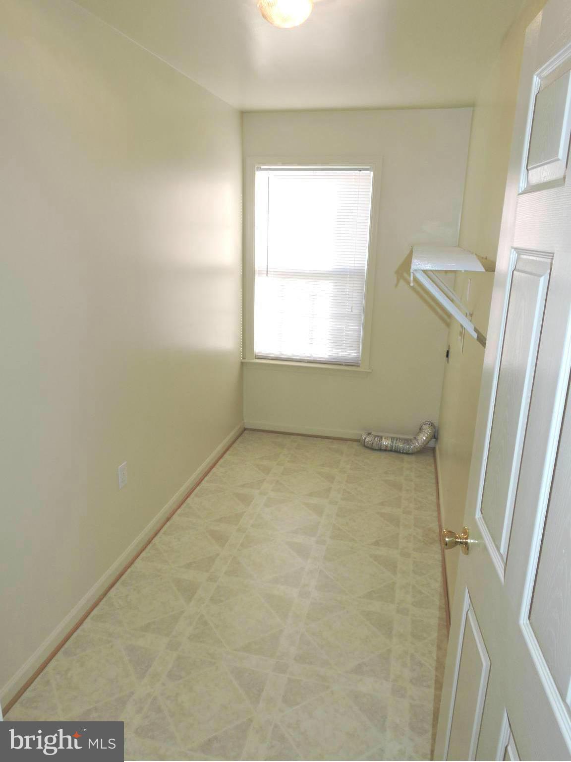 132 Ranson Estates Circle Ranson, WV 25438 - Photo 10 of 30 Nice main level laundry room w/shelving & a window