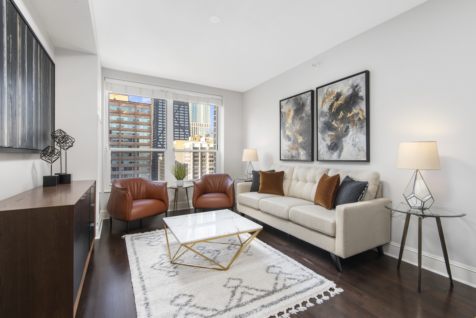 a living room with furniture and a window