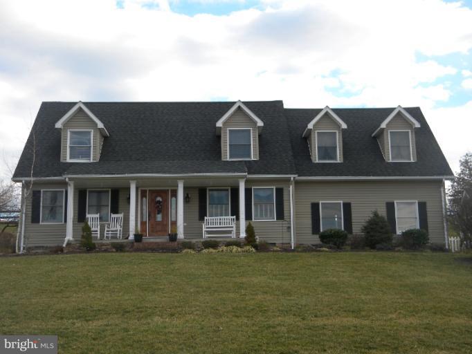 2930 Apple Pie Ridge Road Winchester, VA 22603 - Photo 15 of 24 front view of a house with a yard