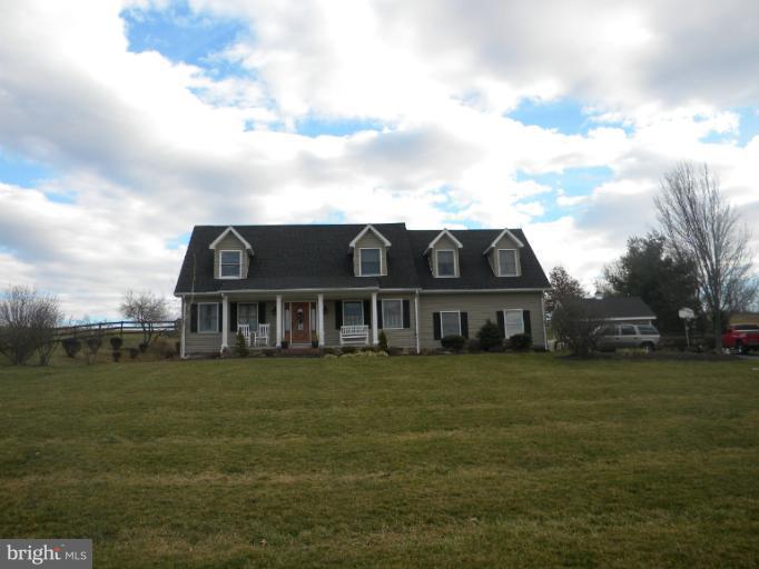 2930 Apple Pie Ridge Road Winchester, VA 22603 - Photo 21 of 24 a view of a house with a big yard and large trees