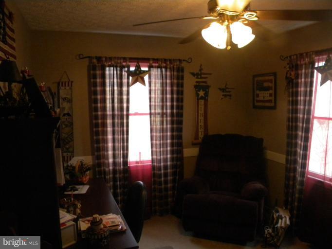 2930 Apple Pie Ridge Road Winchester, VA 22603 - Photo 5 of 24 a view of a livingroom with furniture and a window