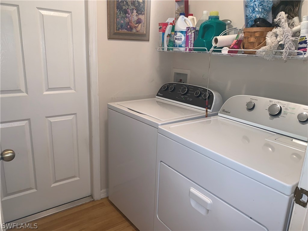 18599 Flamingo Road Fort Myers, FL 33967 - Photo 15 of 30 a utility room with dryer and washer