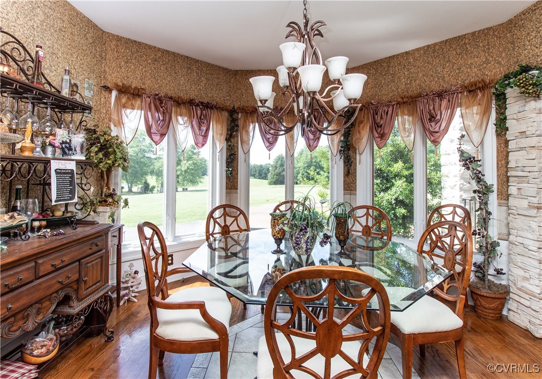 5301 Middle Road Prince George, VA 23875 - Photo 6 of 24 a view of a dining room with furniture wooden floor and chandelier