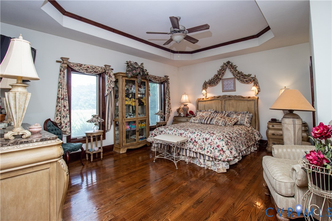 5301 Middle Road Prince George, VA 23875 - Photo 10 of 24 a bedroom with a bed and wooden floor