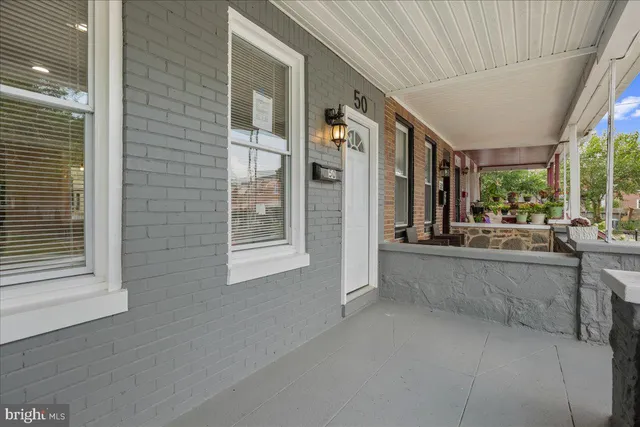 a view of a living room and entry way