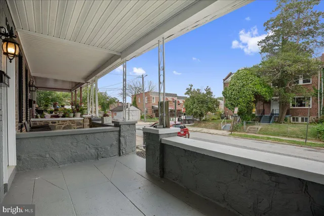 a view of a kitchen with kitchen island and a large window