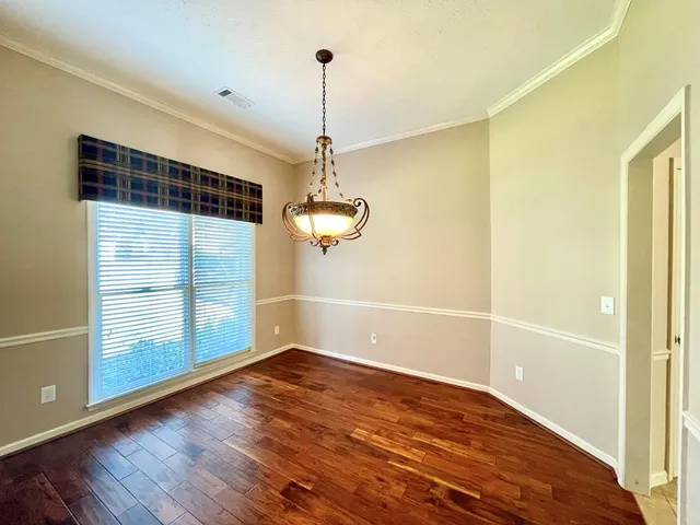 a kitchen with stainless steel appliances granite countertop a stove sink and cabinets