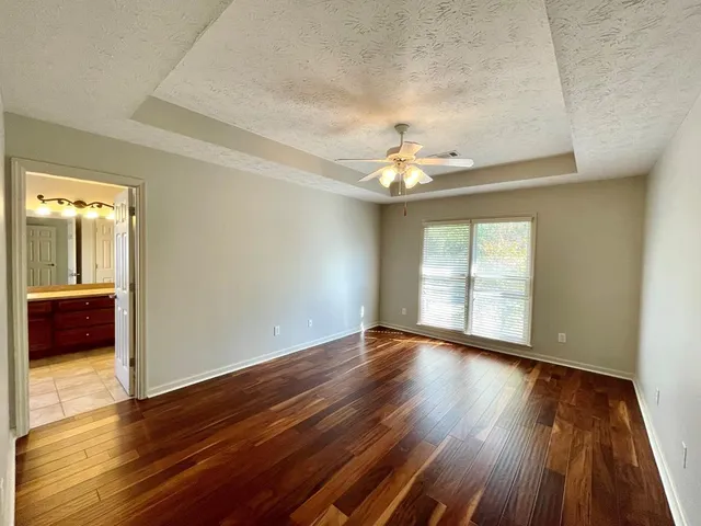 a view of swimming pool with a patio