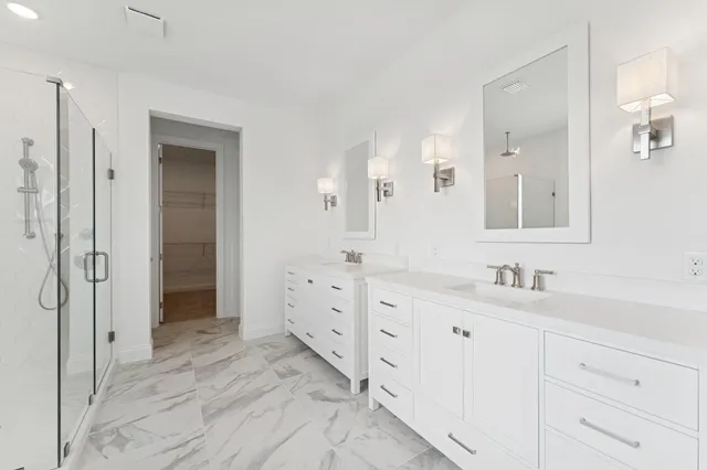 a bathroom with a sink and a shower