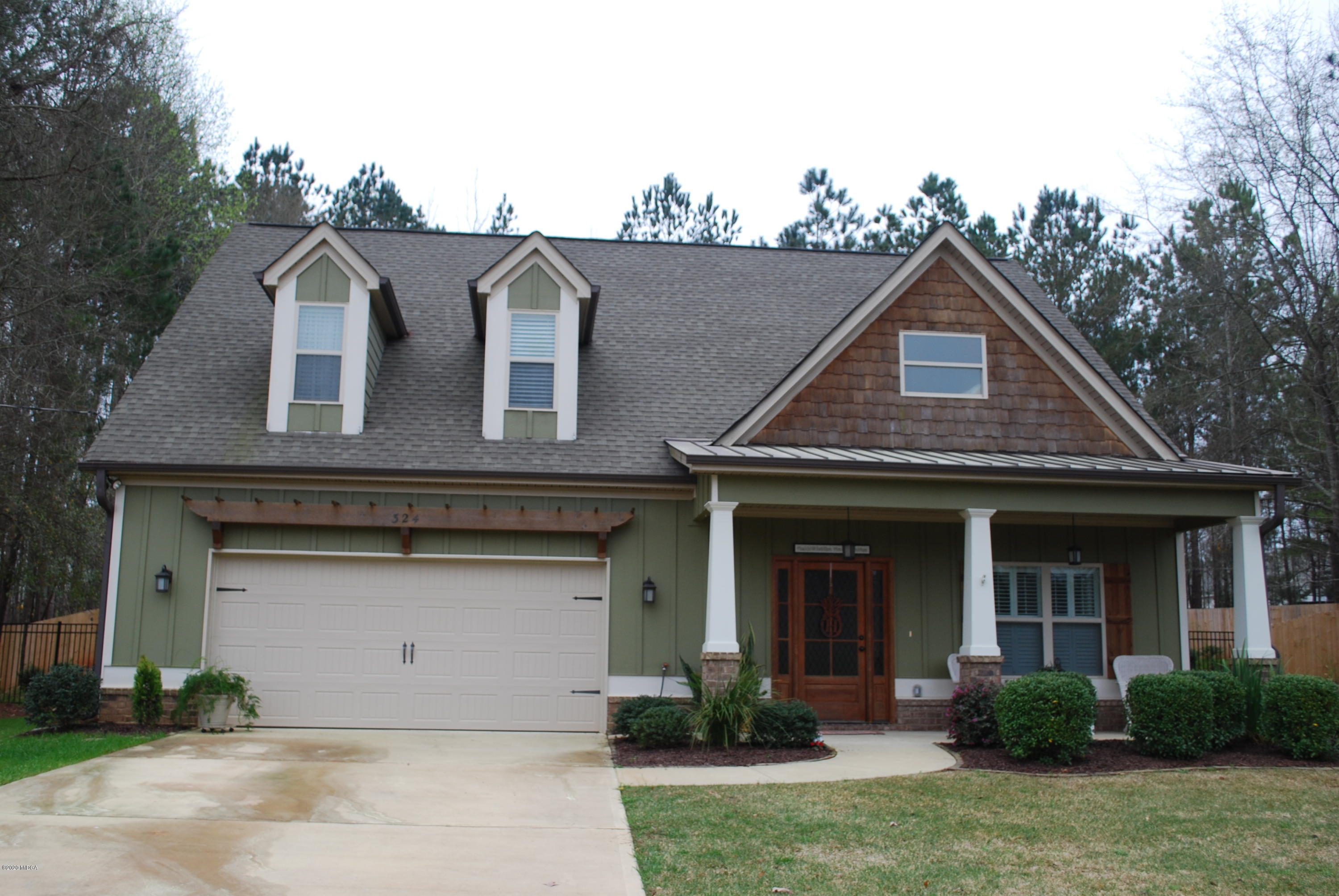 324 Walnut Grove Road Gray, GA 31032 - Photo 2 of 37 front view of a house with a yard
