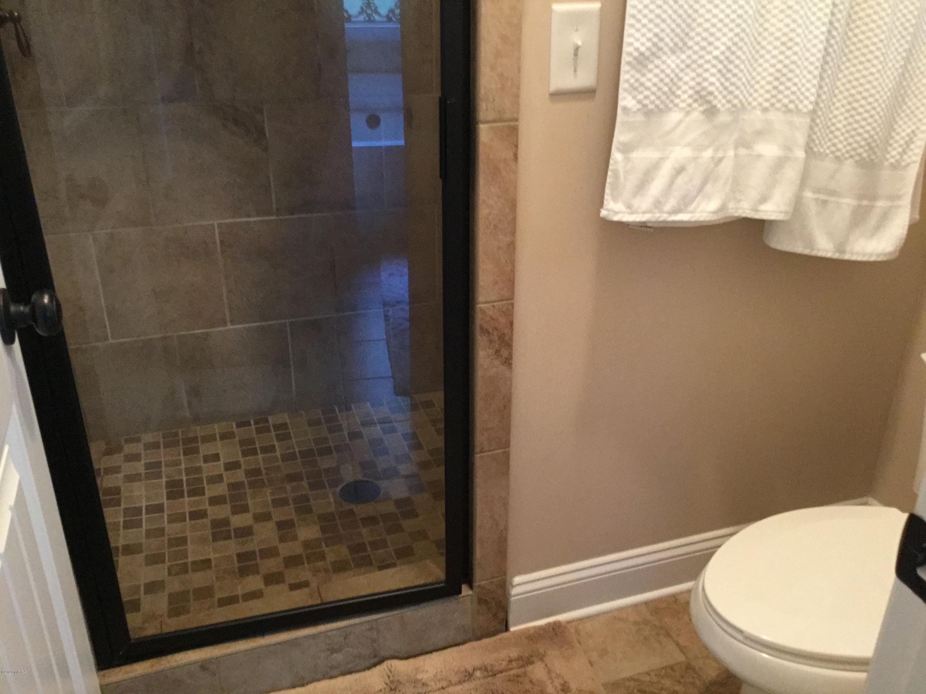 324 Walnut Grove Road Gray, GA 31032 - Photo 18 of 37 a bathroom with a toilet and a shower
