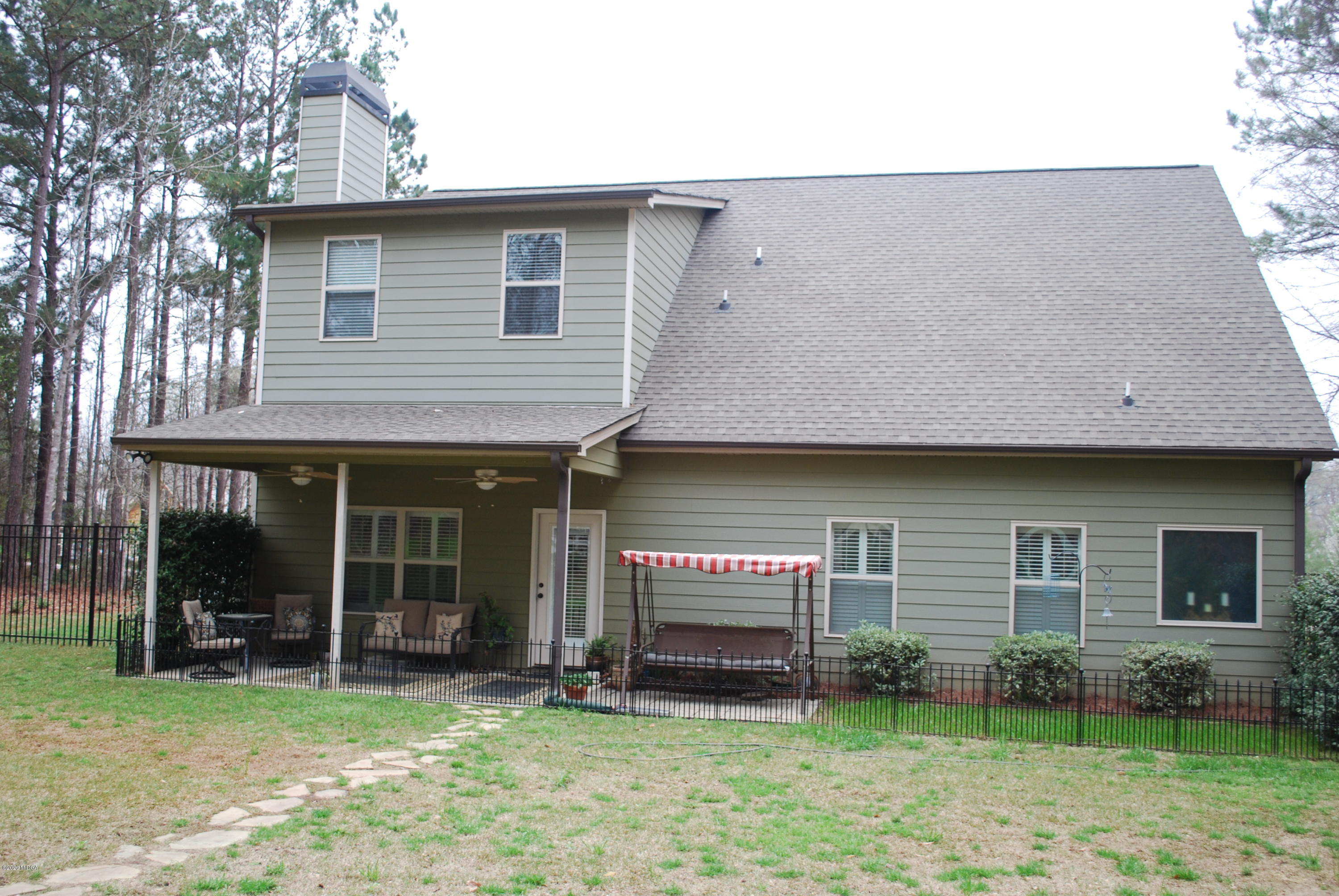 324 Walnut Grove Road Gray, GA 31032 - Photo 29 of 37 a view of a house with a yard and sitting area