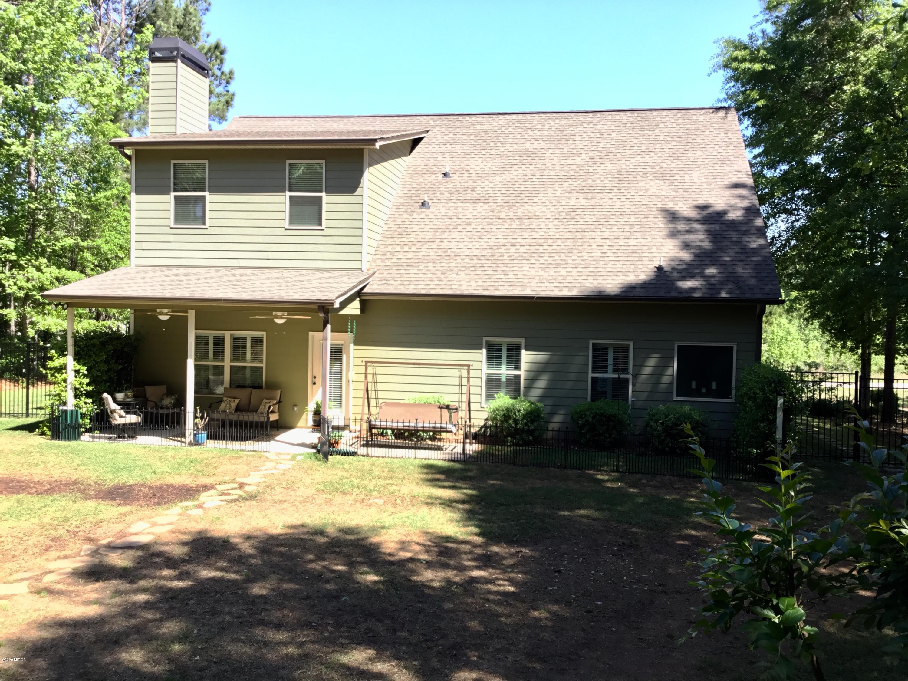 324 Walnut Grove Road Gray, GA 31032 - Photo 30 of 37 a view of a house with a yard