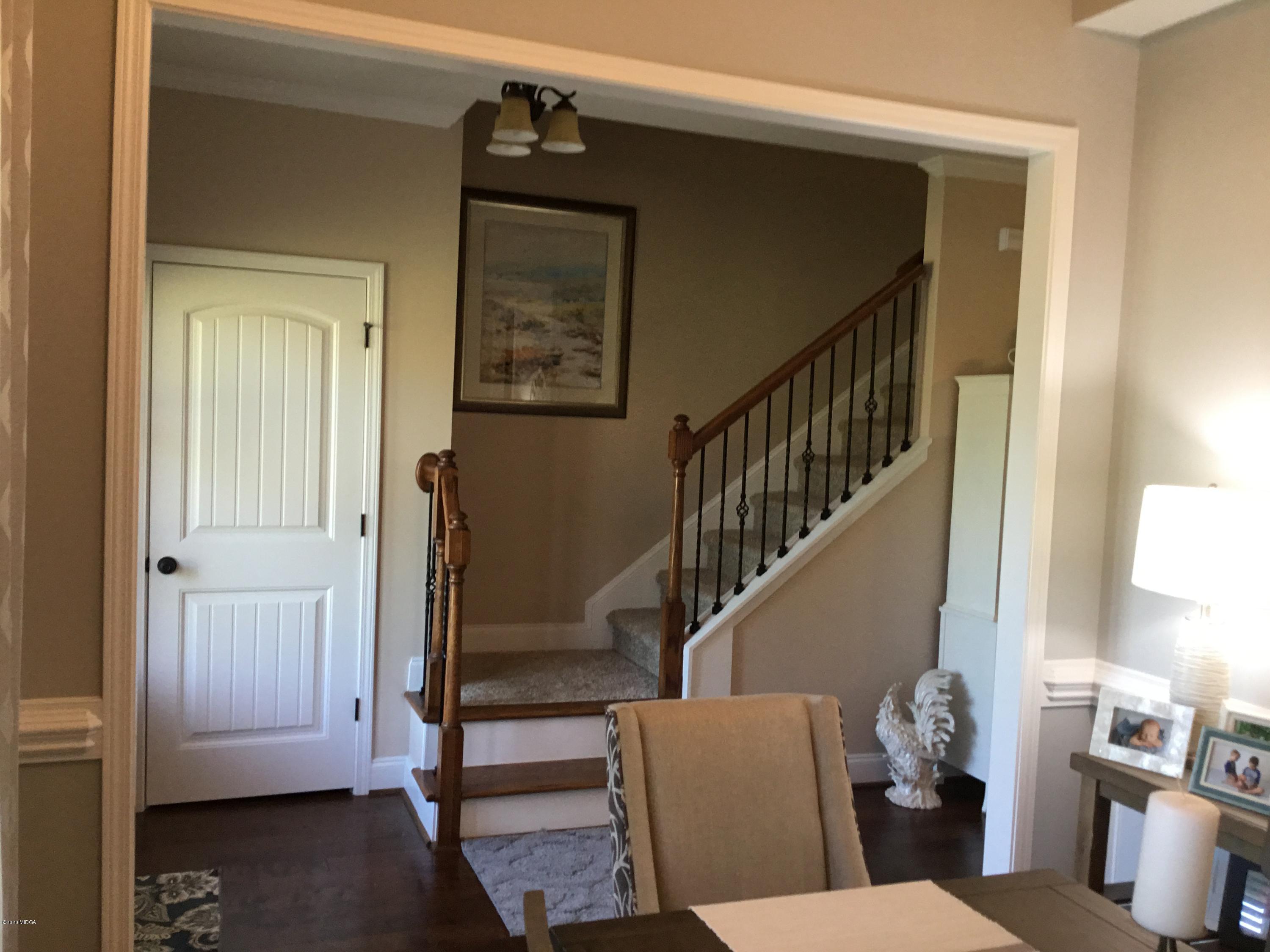 324 Walnut Grove Road Gray, GA 31032 - Photo 4 of 37 a view of entryway and hall with wooden floor