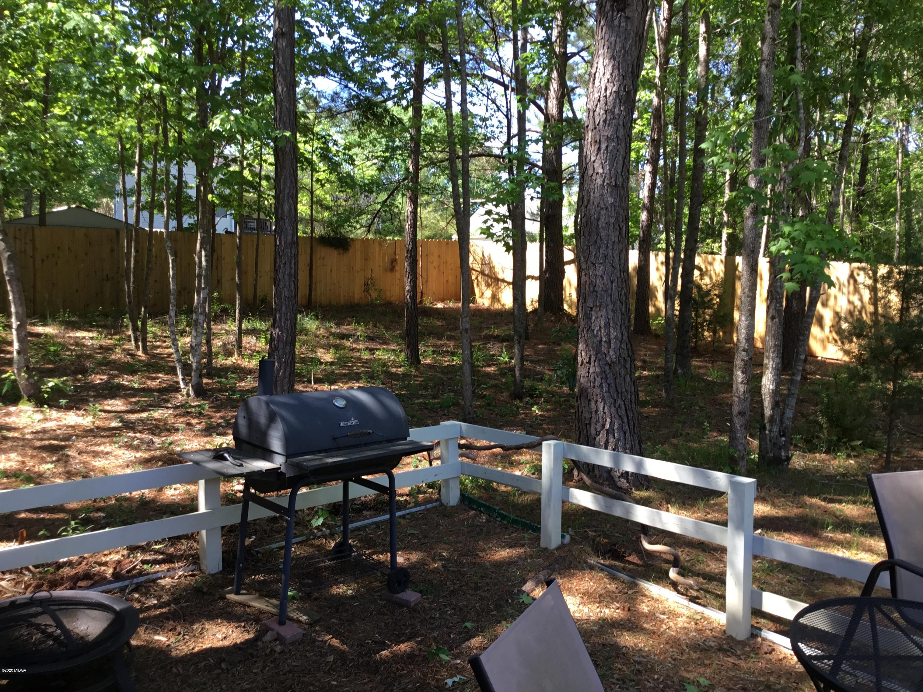 324 Walnut Grove Road Gray, GA 31032 - Photo 32 of 37 a view of a backyard with sitting area