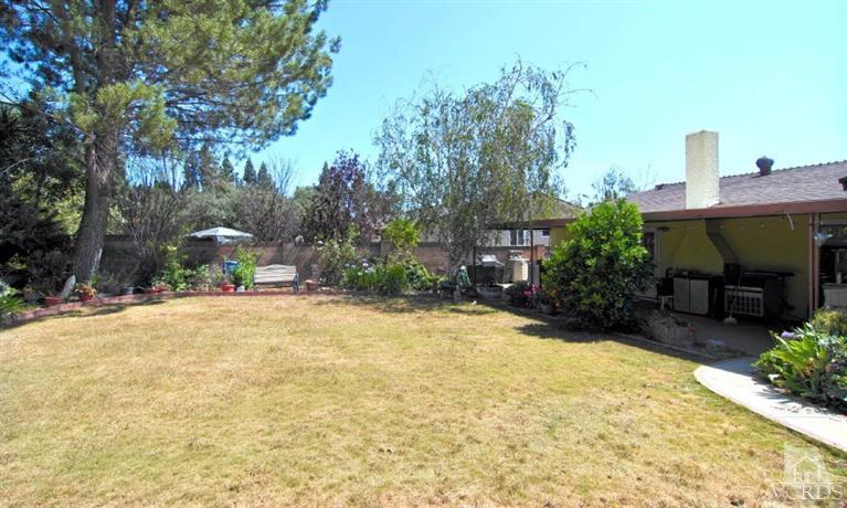 256 Kanan Road Oak Park, CA 91377 - Photo 25 of 26 a view of a backyard with sitting area