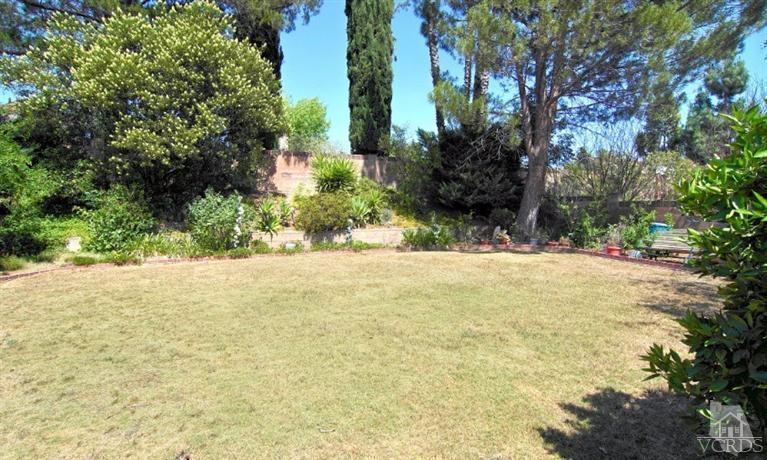 256 Kanan Road Oak Park, CA 91377 - Photo 26 of 26 a view of yard with tree in the background