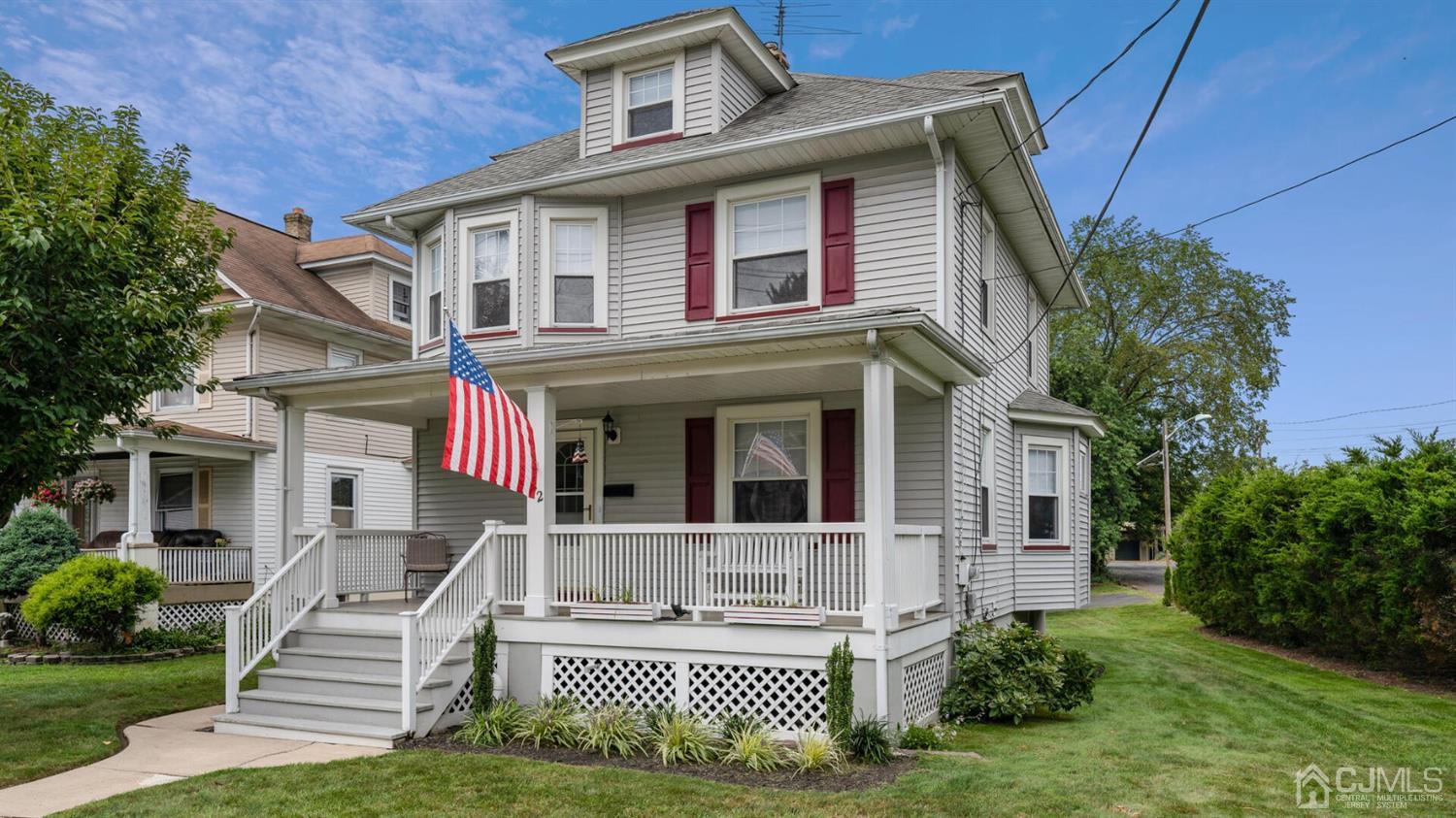 122 New Market Road Dunellen, NJ 08812 - Photo 1 of 28 front view of a house with a yard