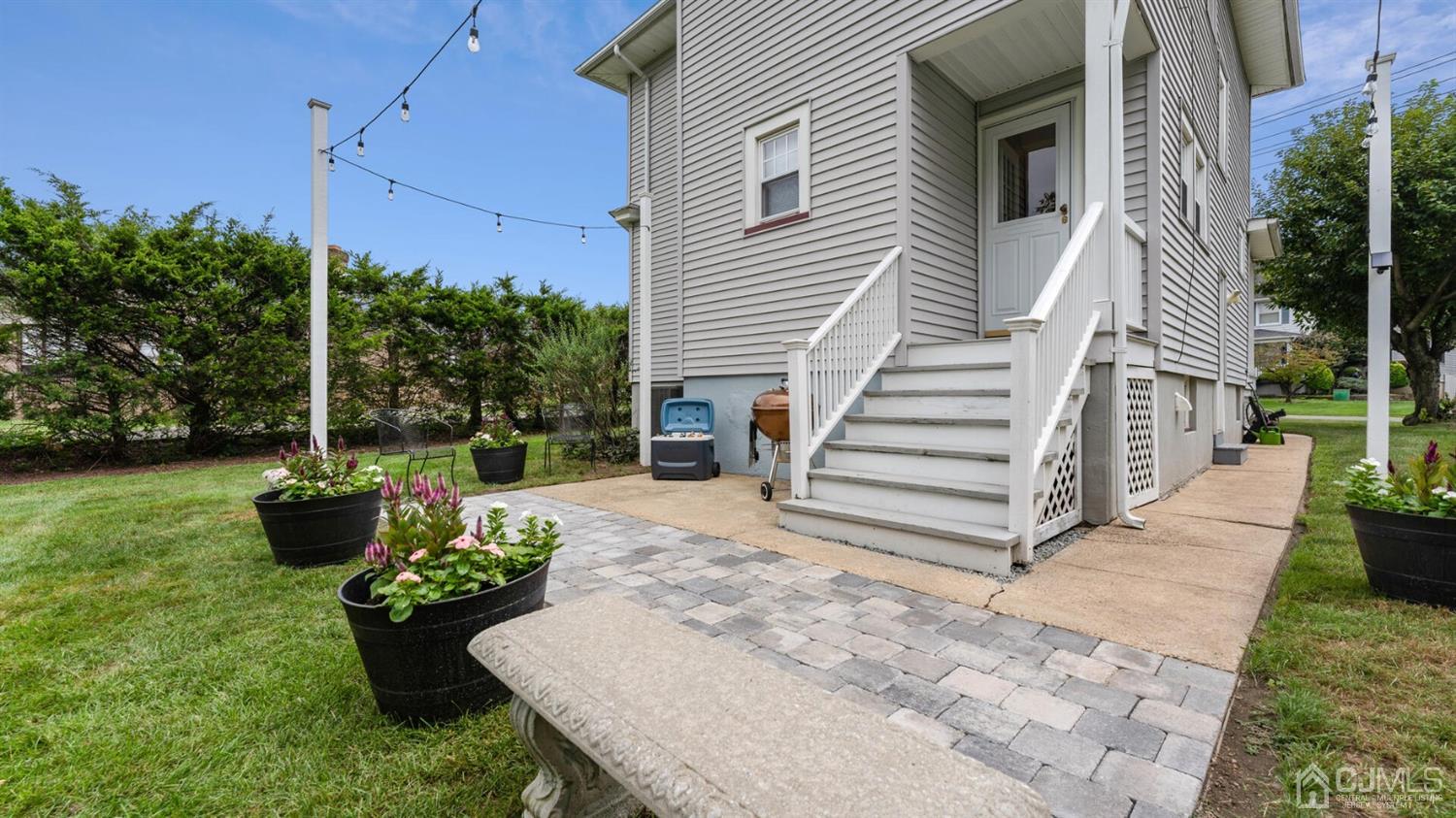 122 New Market Road Dunellen, NJ 08812 - Photo 25 of 28 a view of a backyard with sitting area