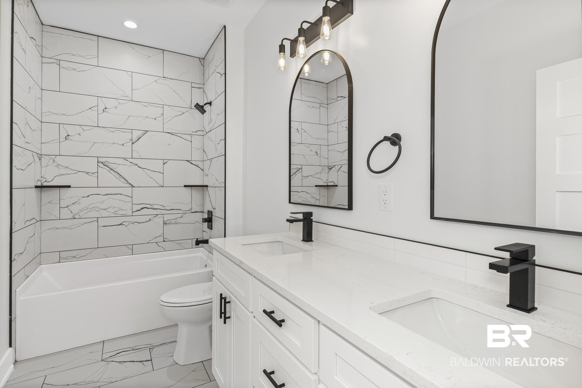 10180 Pineview Drive Foley, AL 36535 - Photo 28 of 47 Bathroom featuring double vanity, washtub / shower combination, light marble finish flooring, and recessed lighting