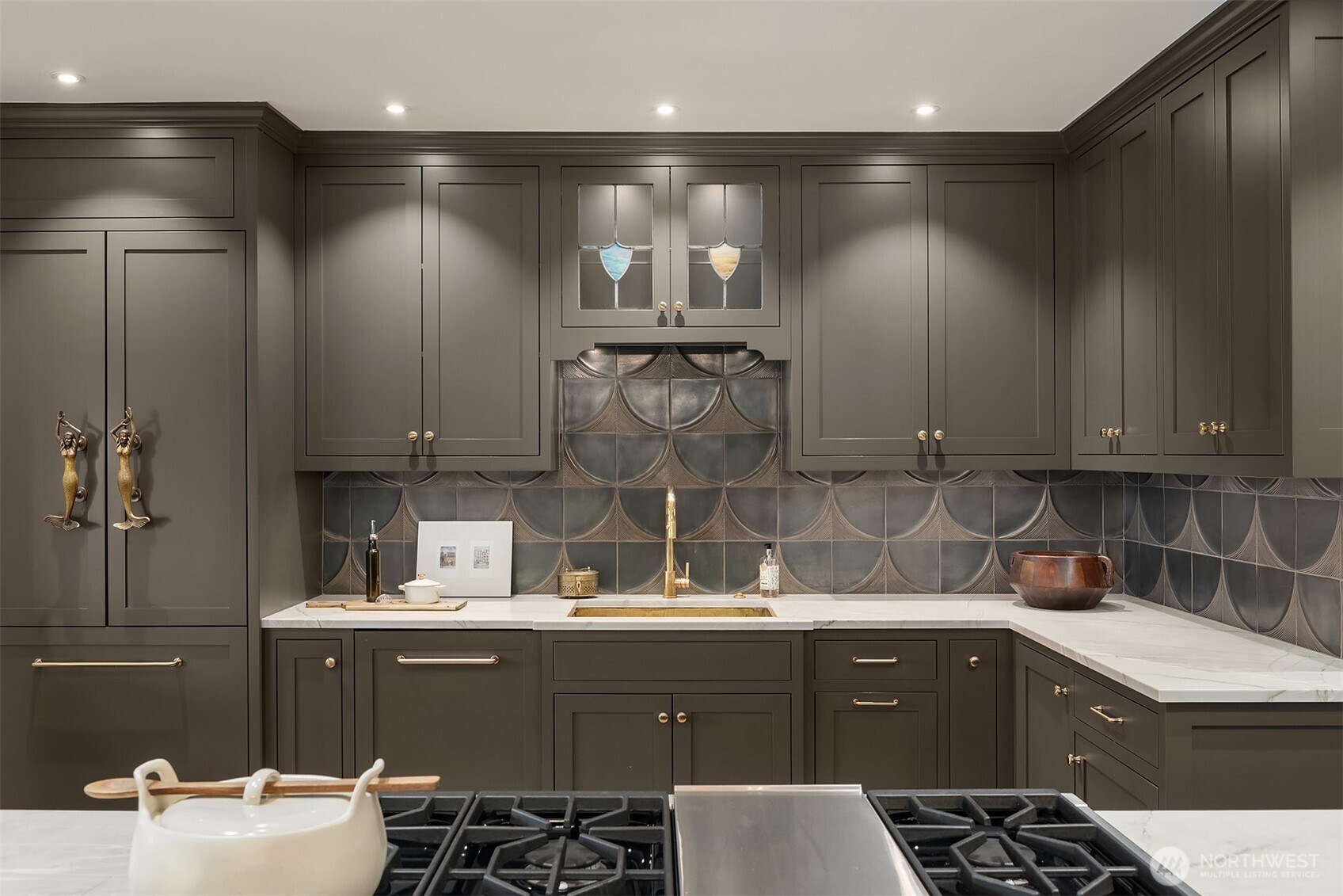 3220 Sierra Drive South Seattle, WA 98144 - Photo 13 of 39 a kitchen with a sink and cabinets