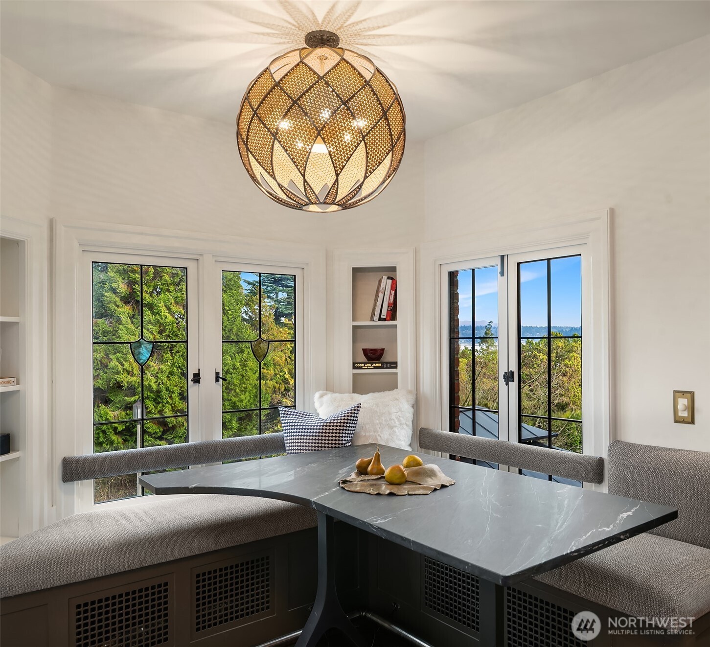 3220 Sierra Drive South Seattle, WA 98144 - Photo 15 of 39 a kitchen with a table chairs and a dining table
