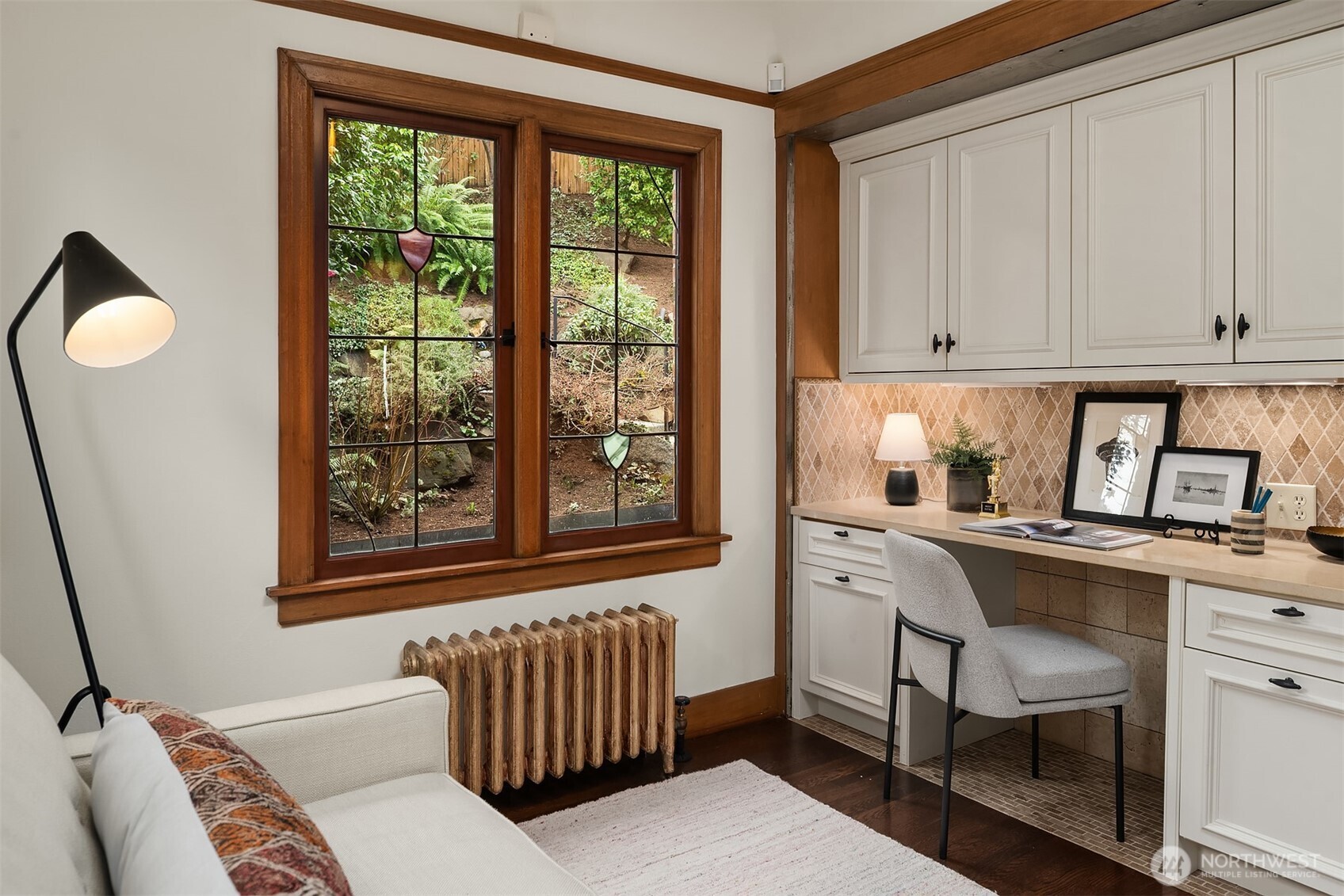 3220 Sierra Drive South Seattle, WA 98144 - Photo 18 of 39 a kitchen with a window a sink and a cabinets