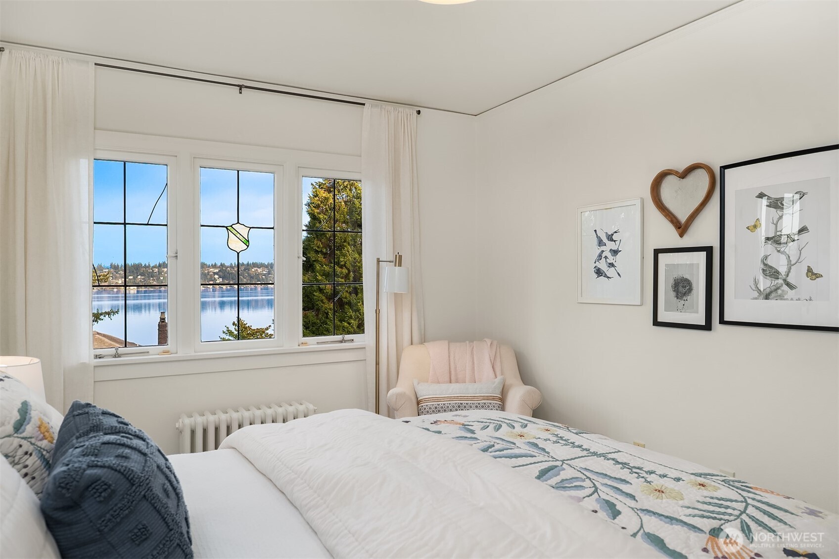 3220 Sierra Drive South Seattle, WA 98144 - Photo 24 of 39 a bedroom with a bed and a window