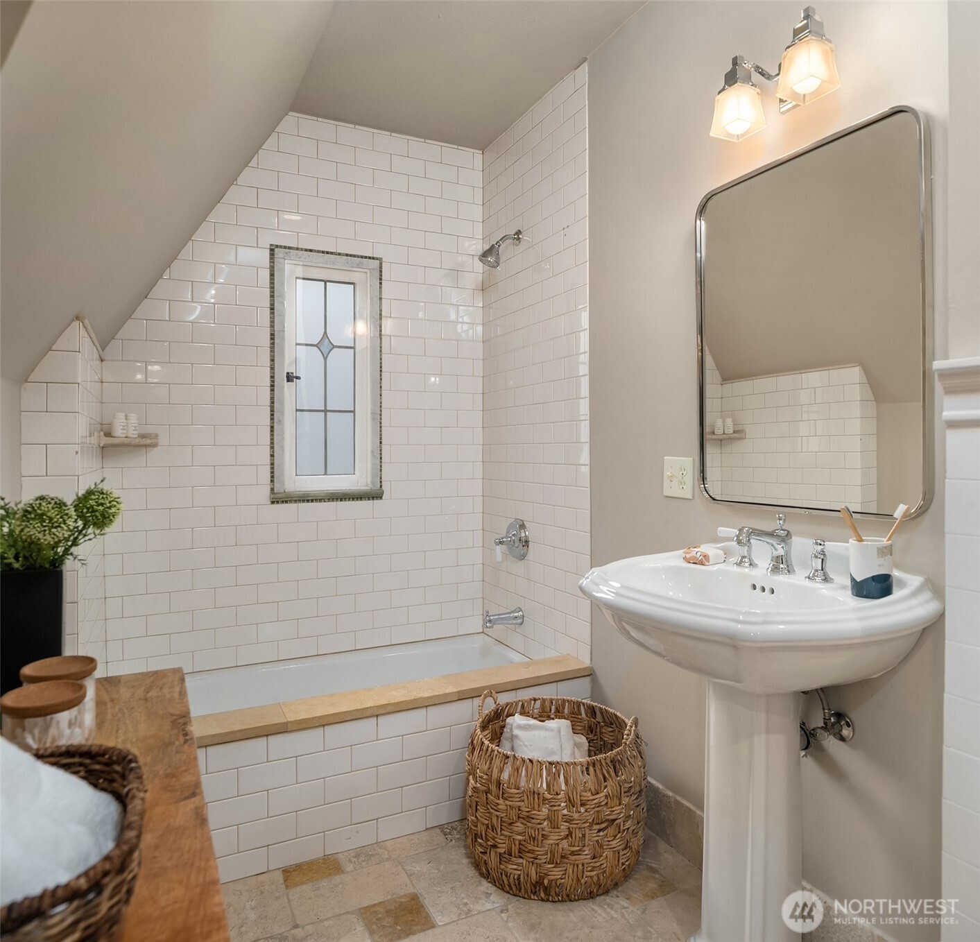 3220 Sierra Drive South Seattle, WA 98144 - Photo 27 of 39 a bathroom with a sink and a mirror