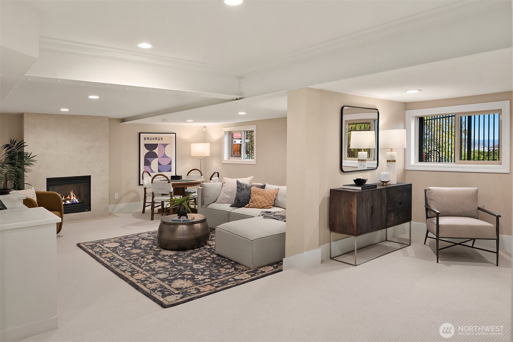 3220 Sierra Drive South Seattle, WA 98144 - Photo 29 of 39 a living room with furniture and a fireplace