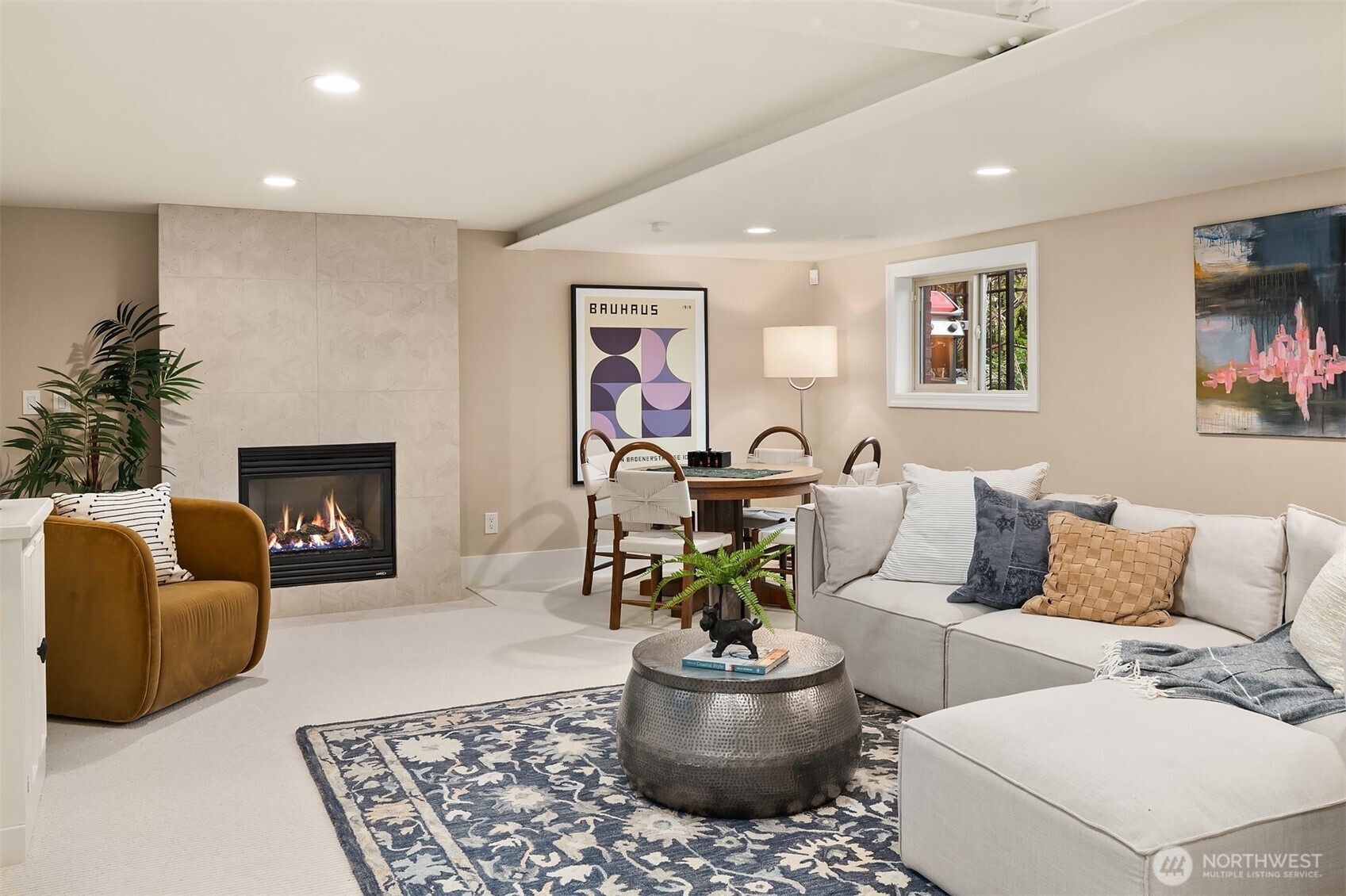 3220 Sierra Drive South Seattle, WA 98144 - Photo 30 of 39 a living room with furniture and a fireplace