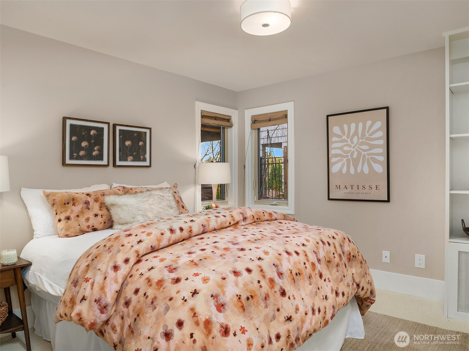 3220 Sierra Drive South Seattle, WA 98144 - Photo 33 of 39 a bedroom with a large bed and a window