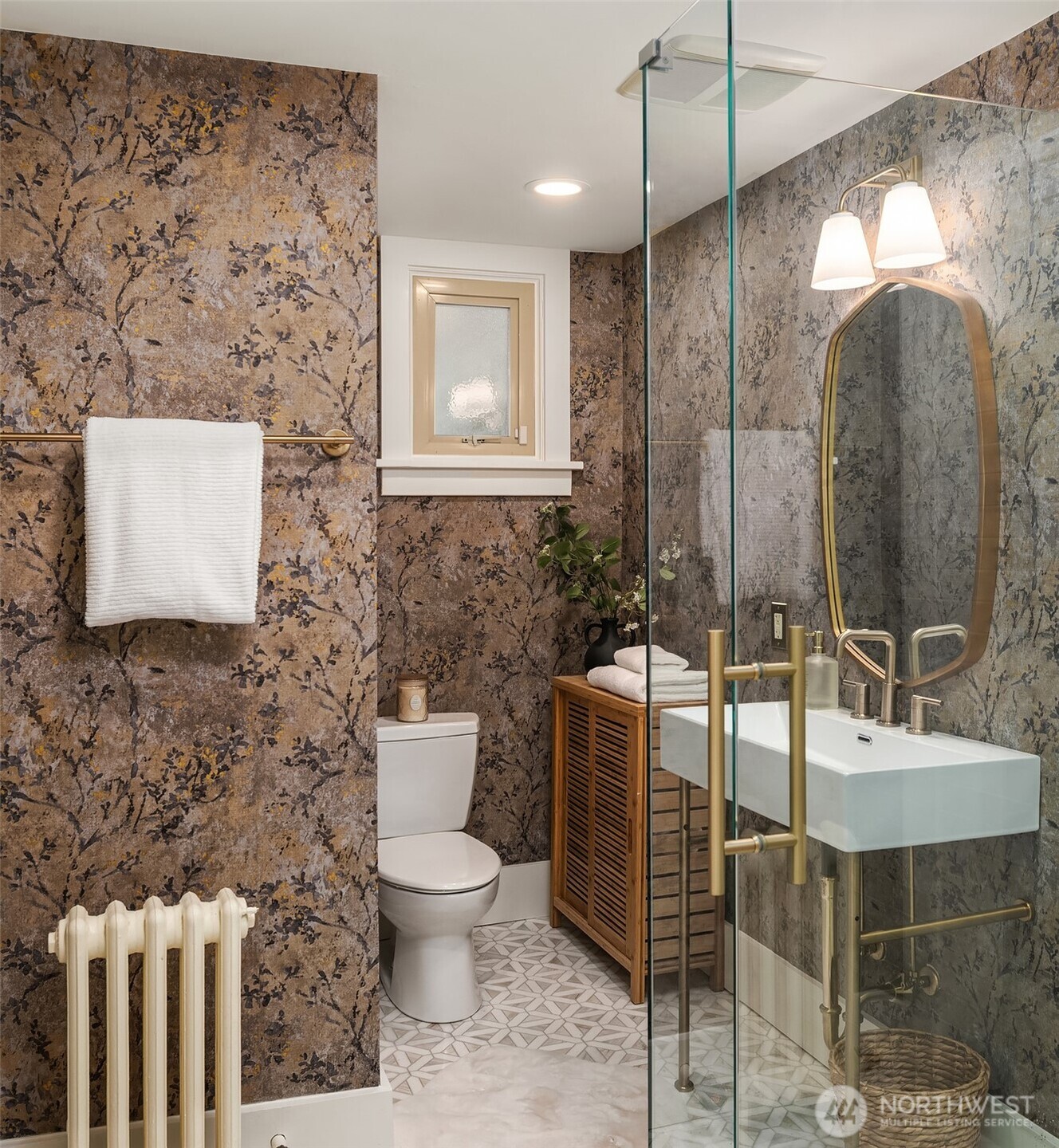 3220 Sierra Drive South Seattle, WA 98144 - Photo 34 of 39 a bathroom with a toilet sink and mirror