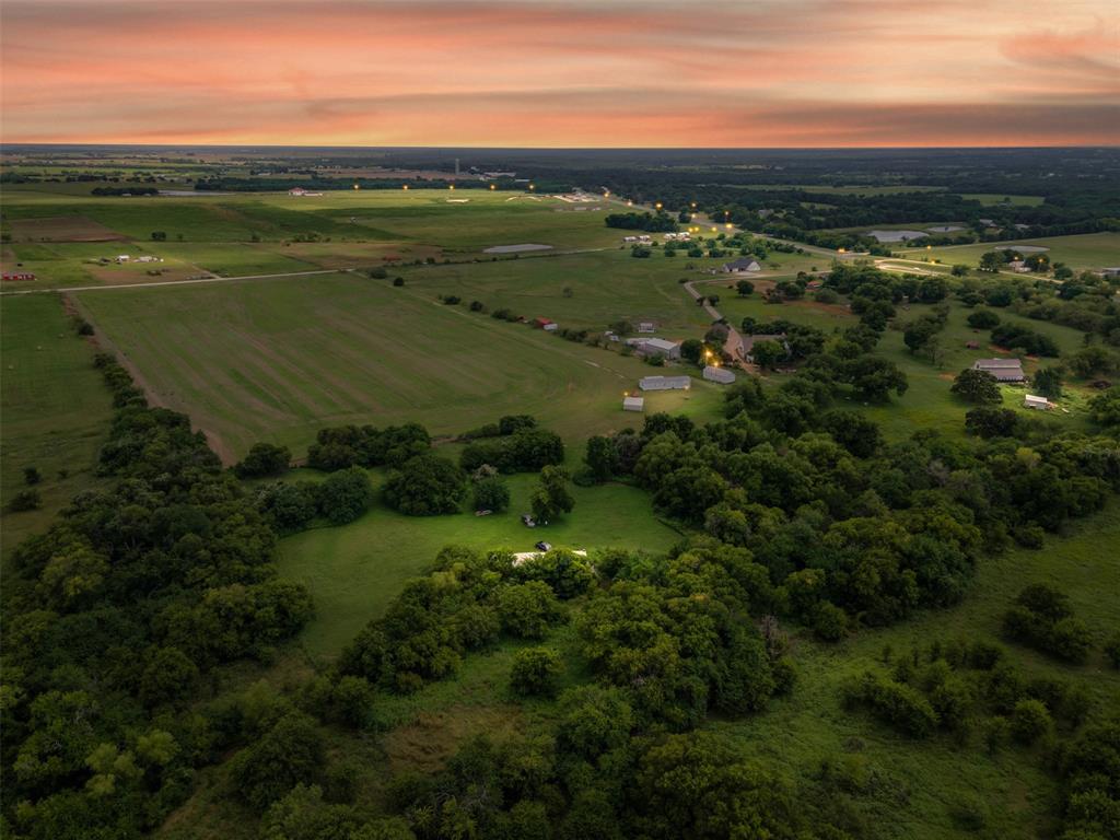 167 Hcr 4105 Covington, TX 76636 - Photo 3 of 32 Aerial view at dusk of a rural view