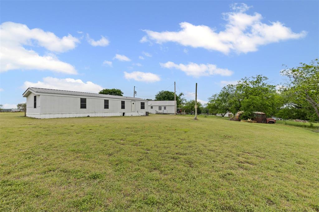 167 Hcr 4105 Covington, TX 76636 - Photo 10 of 32 View of green lawn