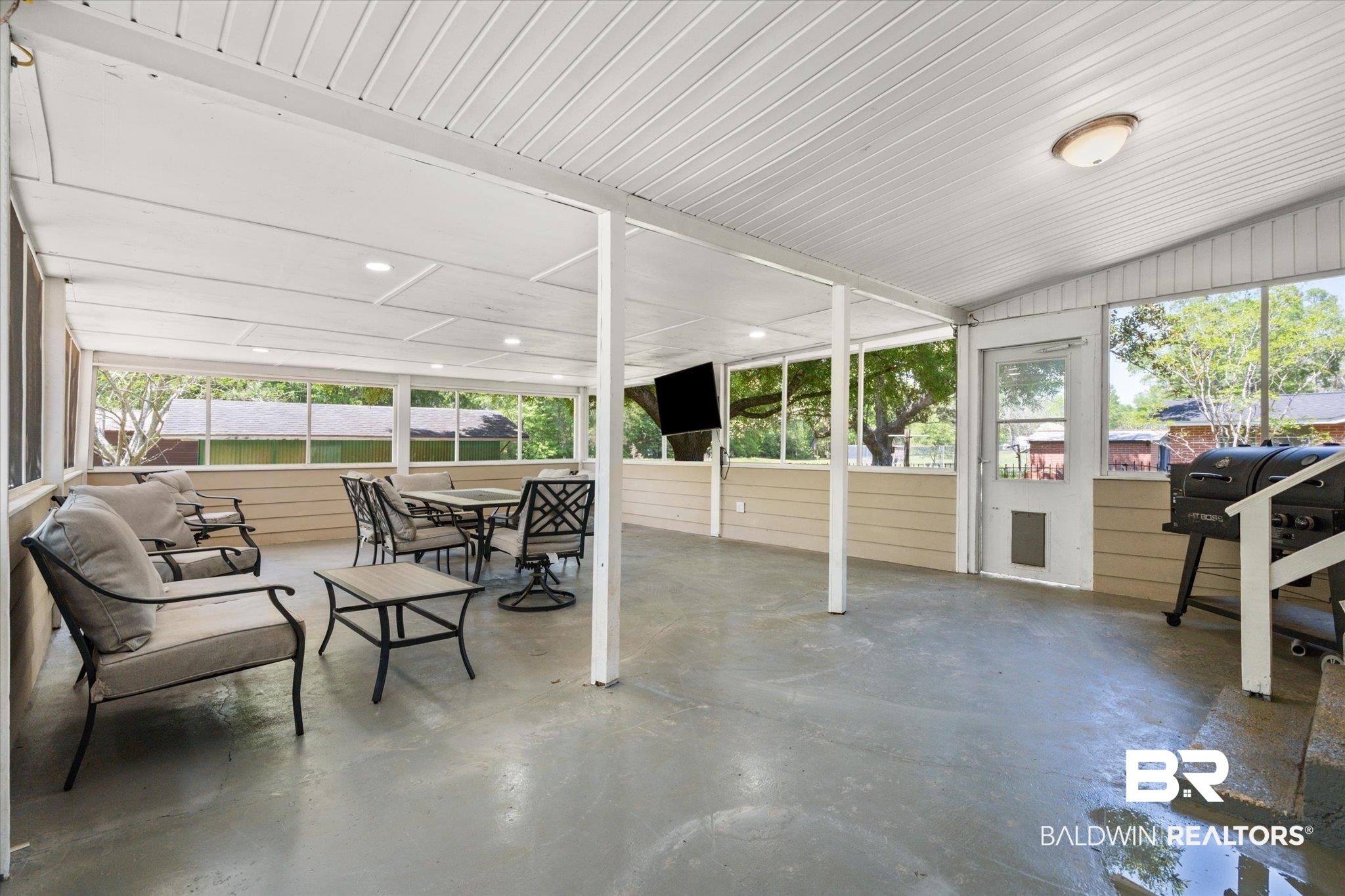 529 Cleveland Road Saraland, AL 36571 - Photo 23 of 31 Sunroom featuring outdoor dining space