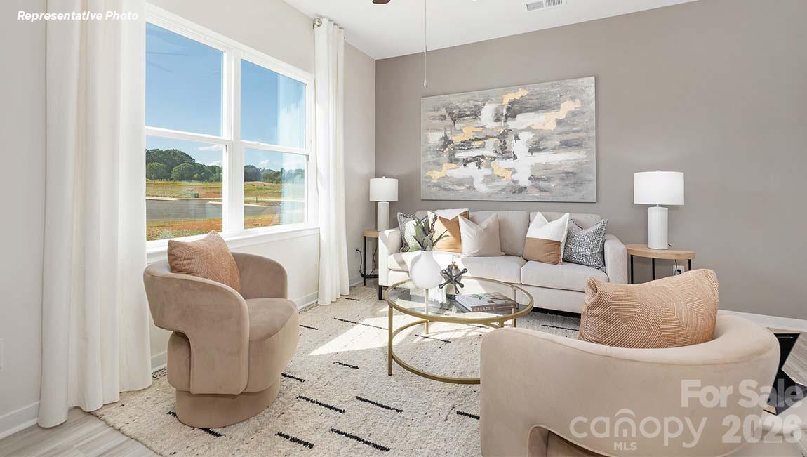 3265 Ora Smith Road Lincolnton, NC 28092 - Photo 7 of 21 a living room with furniture and a large window