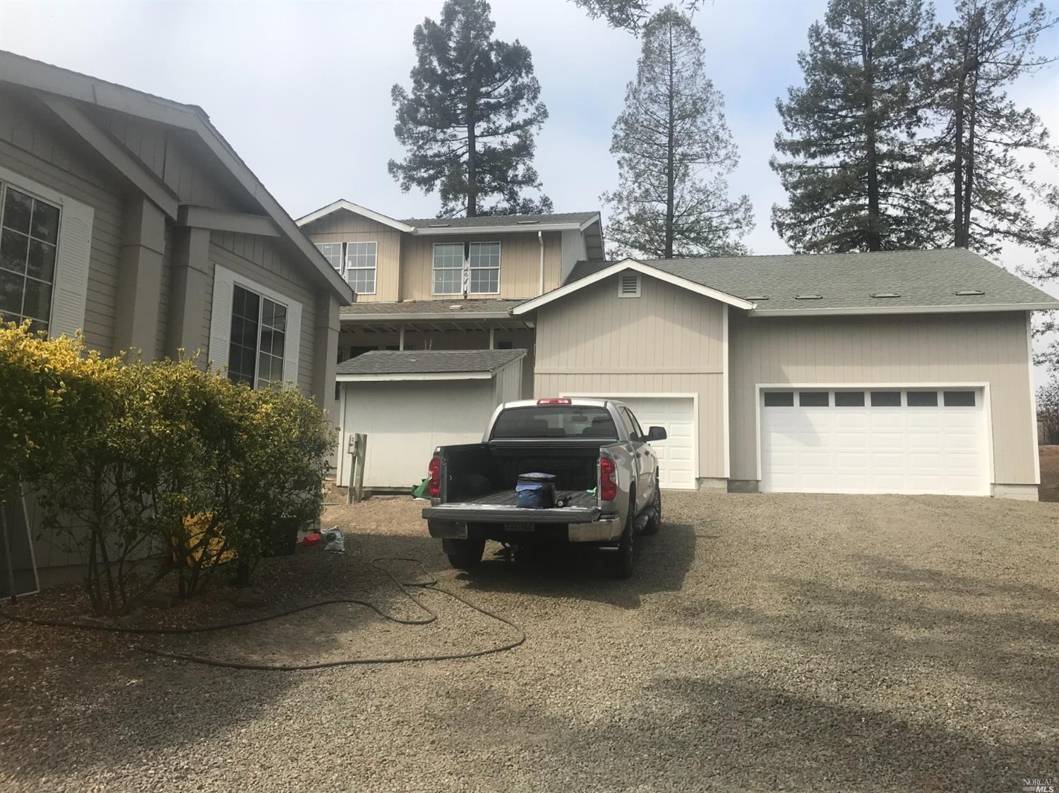 6280 Orchard Station Road Sebastopol, CA 95472 - Photo 1 of 1 Manufactured home is front left, unfinished home is behind truck.