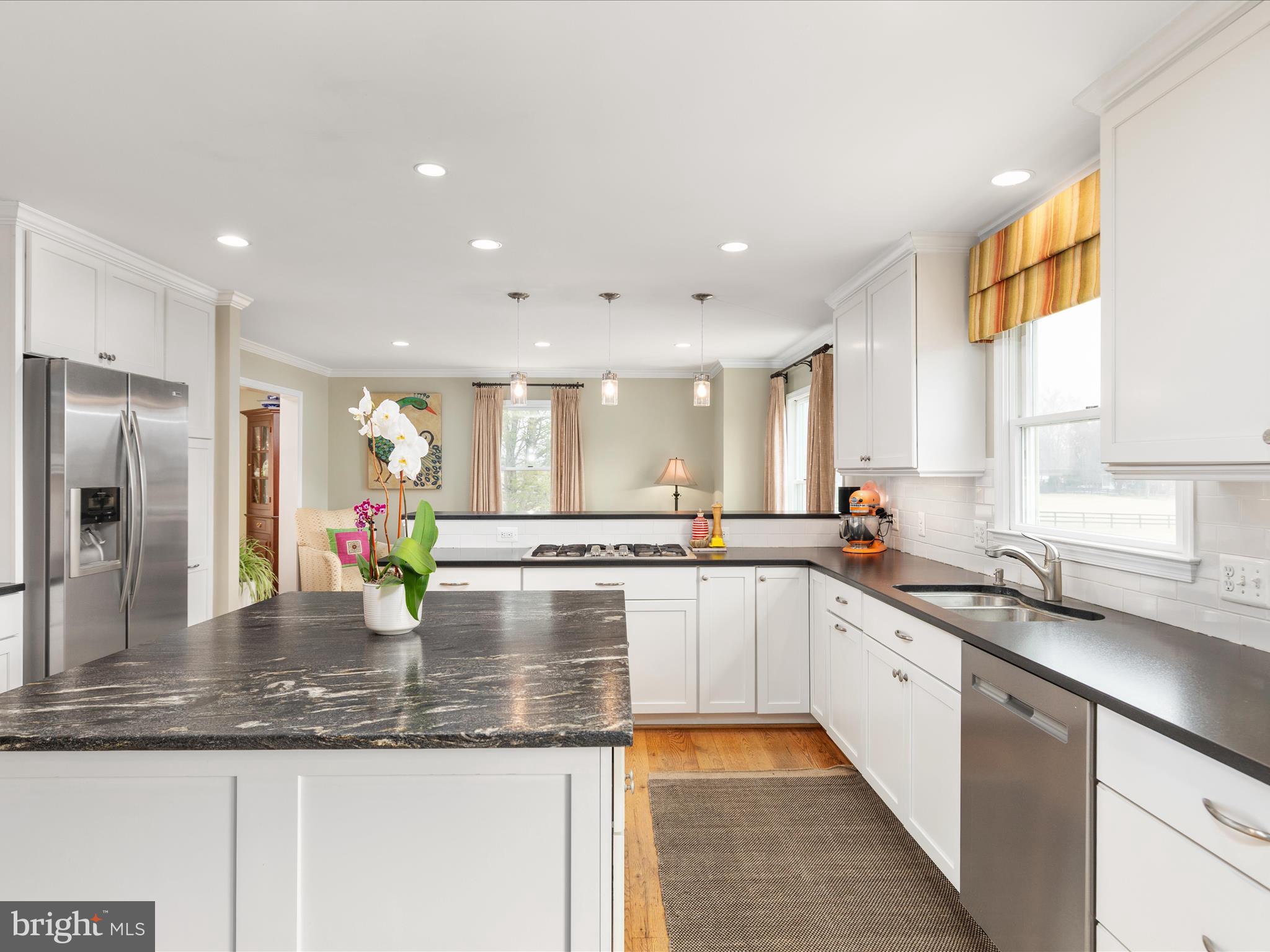 36823 Shoemaker School Road Purcellville, VA 20132 - Photo 12 of 59 a kitchen with sink cabinets and microwave