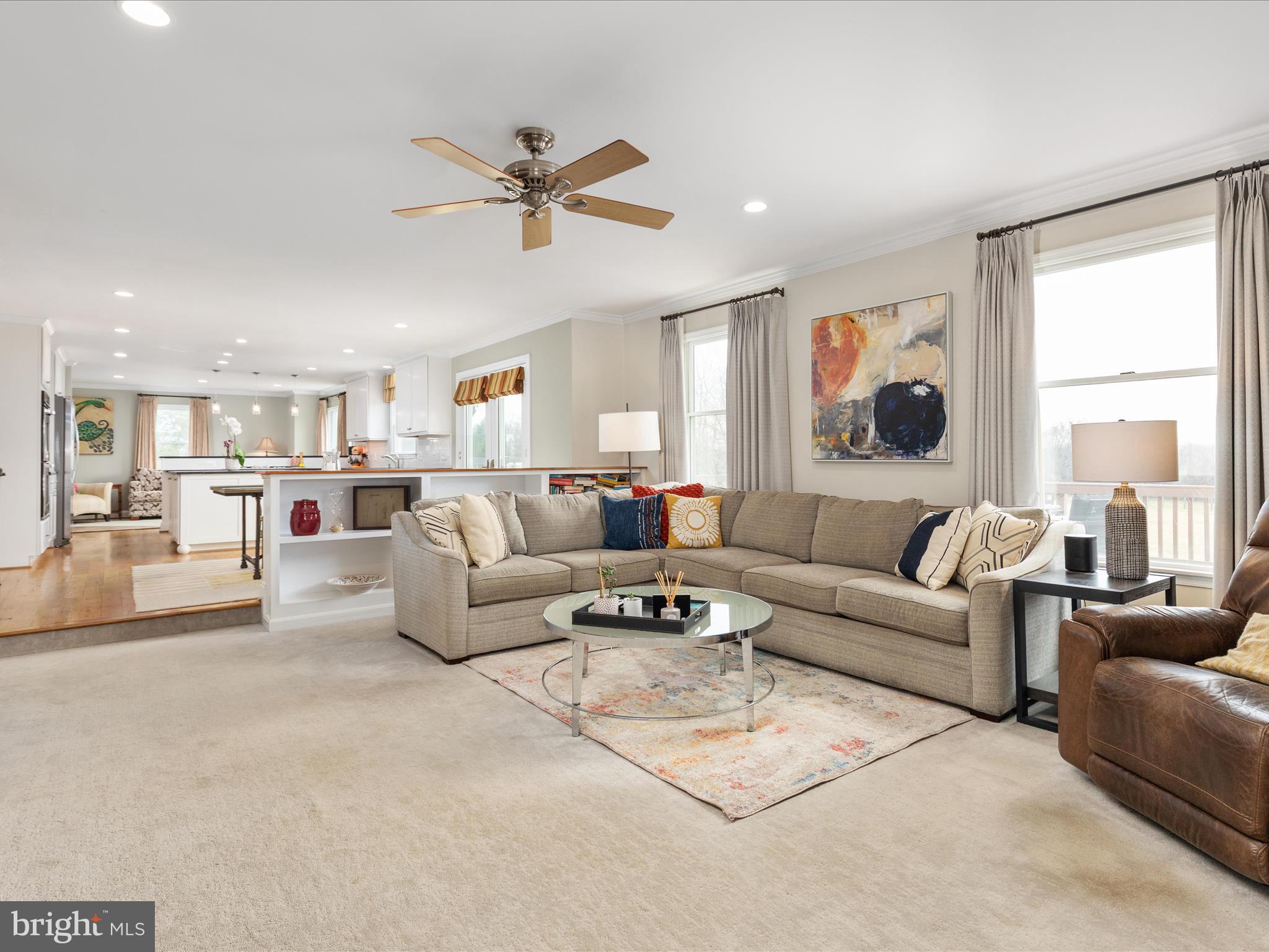 36823 Shoemaker School Road Purcellville, VA 20132 - Photo 18 of 59 a living room with furniture and a large window
