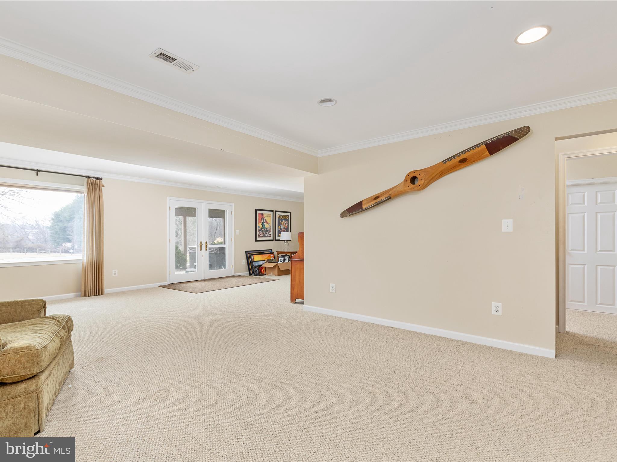 36823 Shoemaker School Road Purcellville, VA 20132 - Photo 26 of 59 a view of a livingroom with furniture and windows