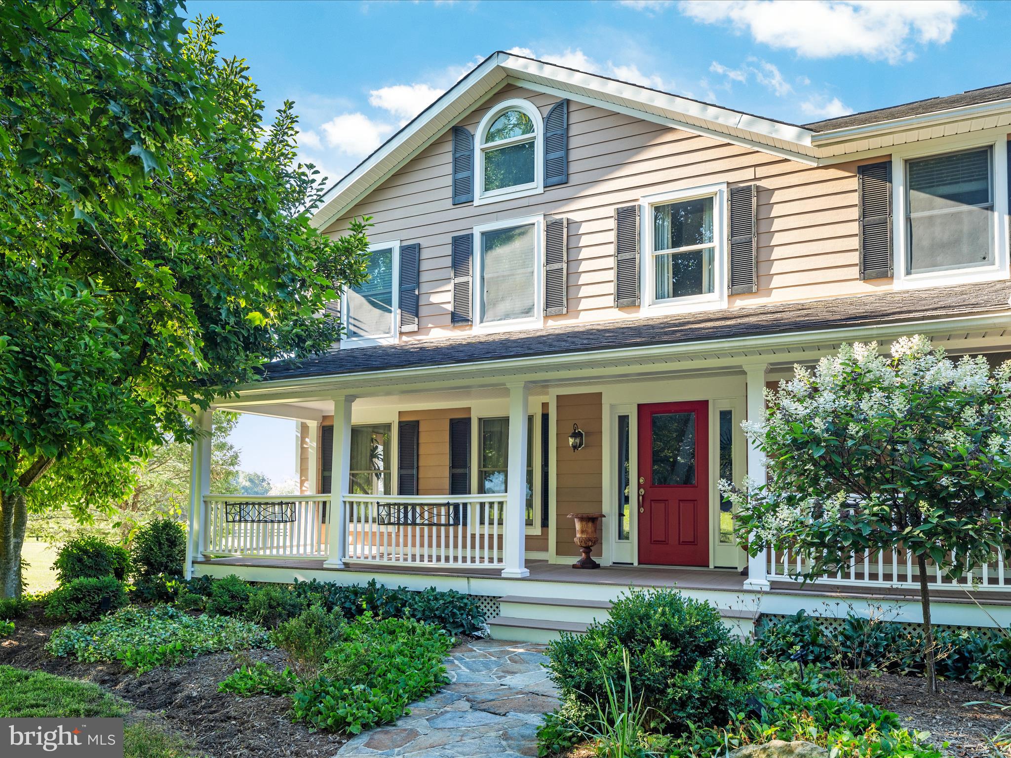 36823 Shoemaker School Road Purcellville, VA 20132 - Photo 32 of 59 a front view of a house with a yard