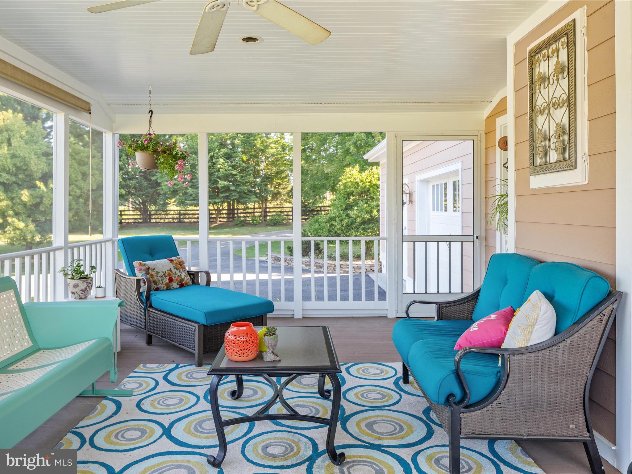 36823 Shoemaker School Road Purcellville, VA 20132 - Photo 35 of 59 a living room filled with furniture and a large window