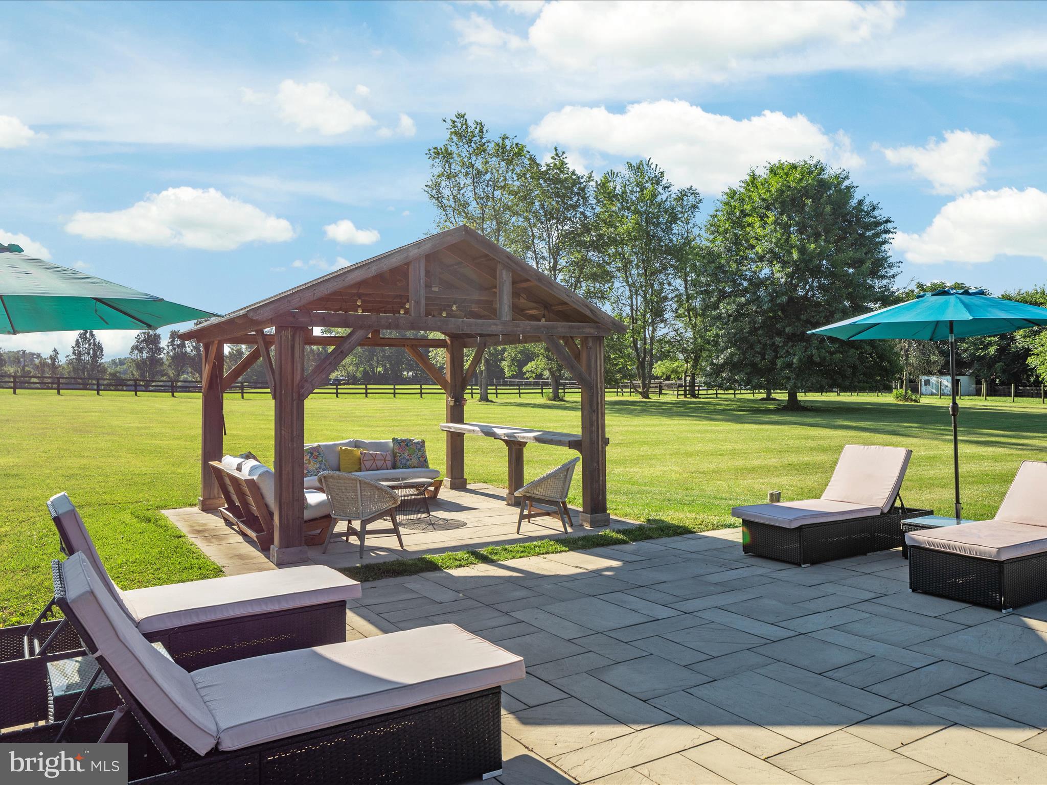 36823 Shoemaker School Road Purcellville, VA 20132 - Photo 37 of 59 a view of a swimming pool with a patio