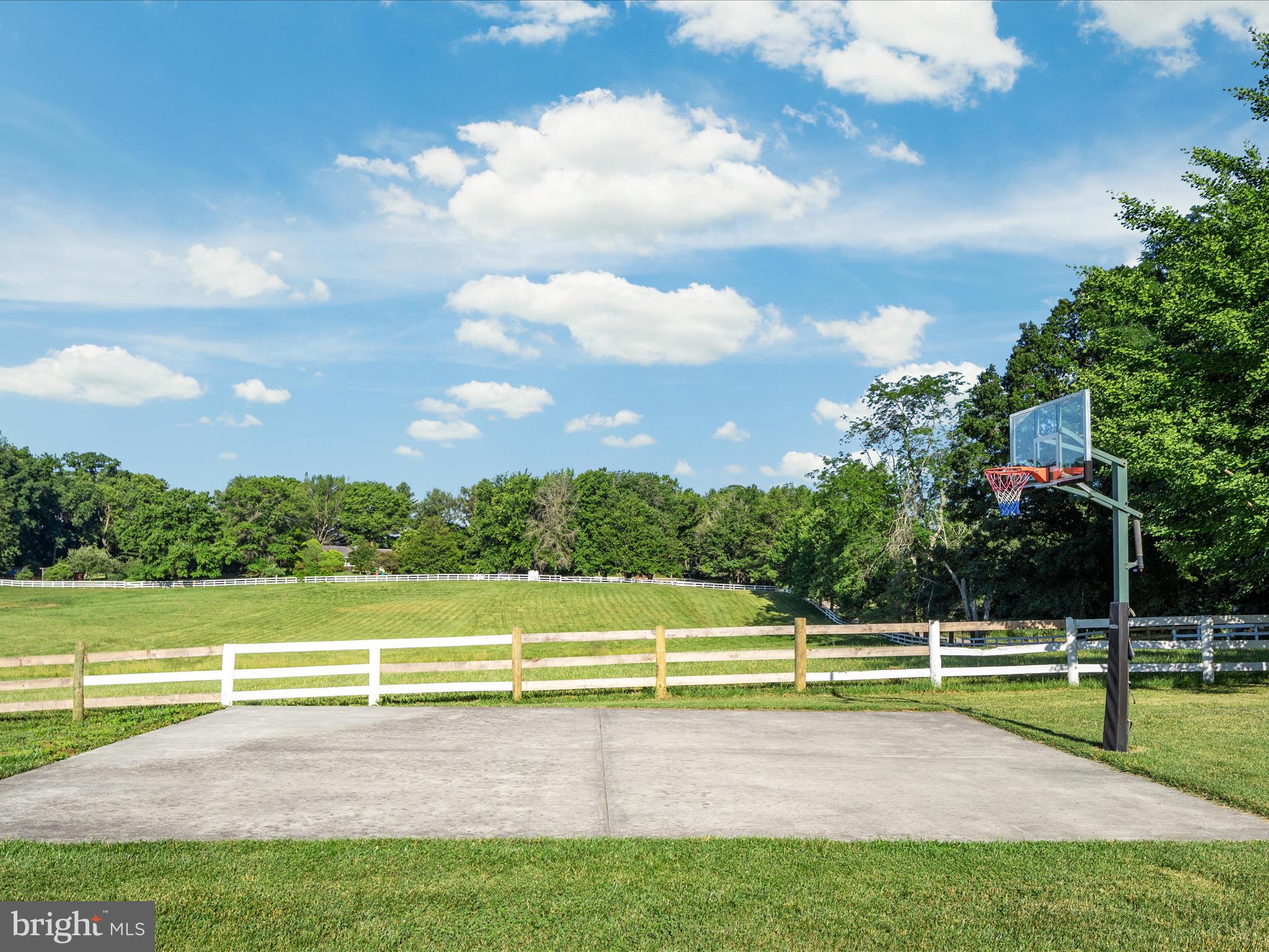 36823 Shoemaker School Road Purcellville, VA 20132 - Photo 47 of 59 a view of a golf course with a lake