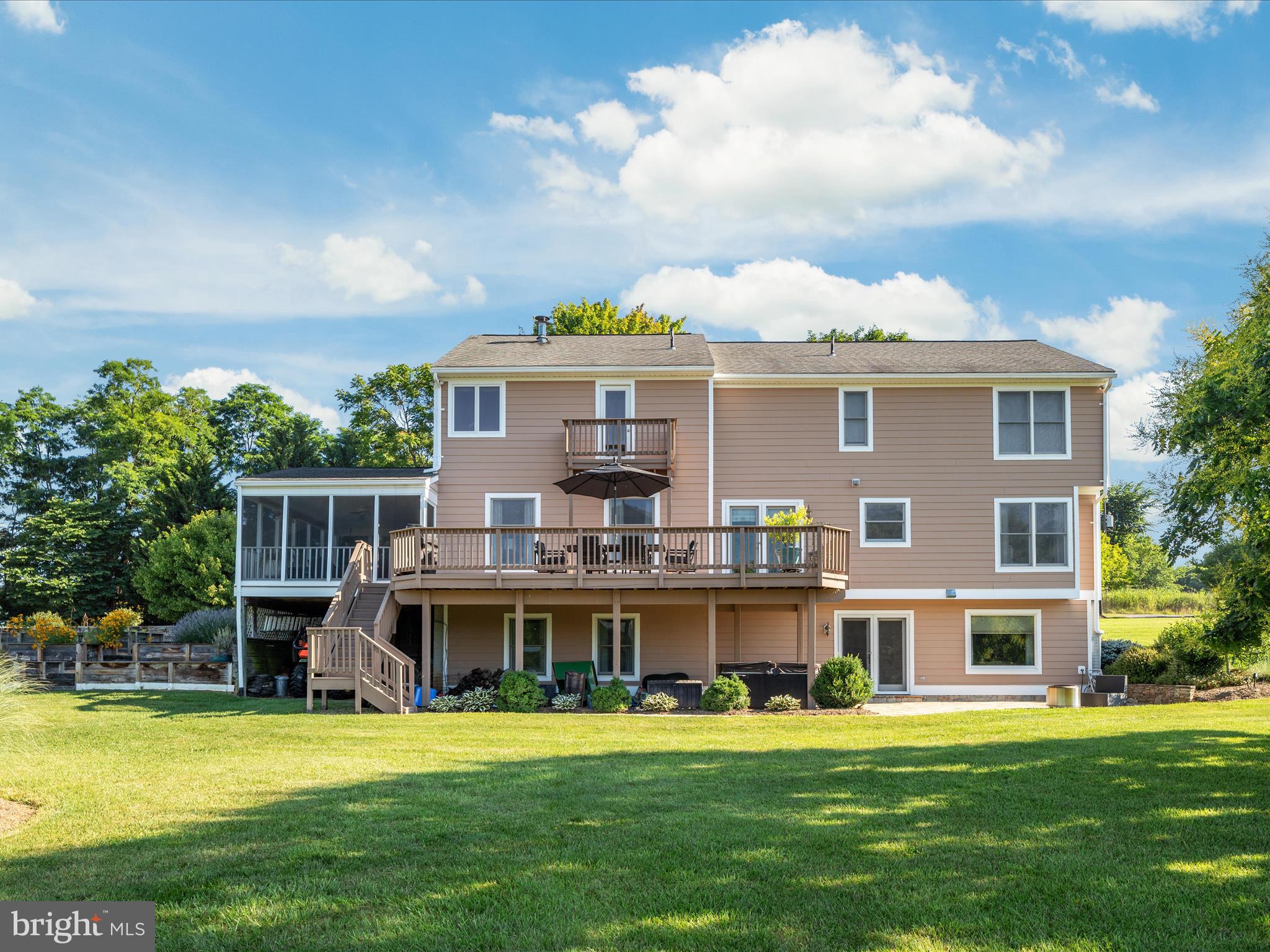 36823 Shoemaker School Road Purcellville, VA 20132 - Photo 48 of 59 a front view of house with yard barbeque and outdoor seating