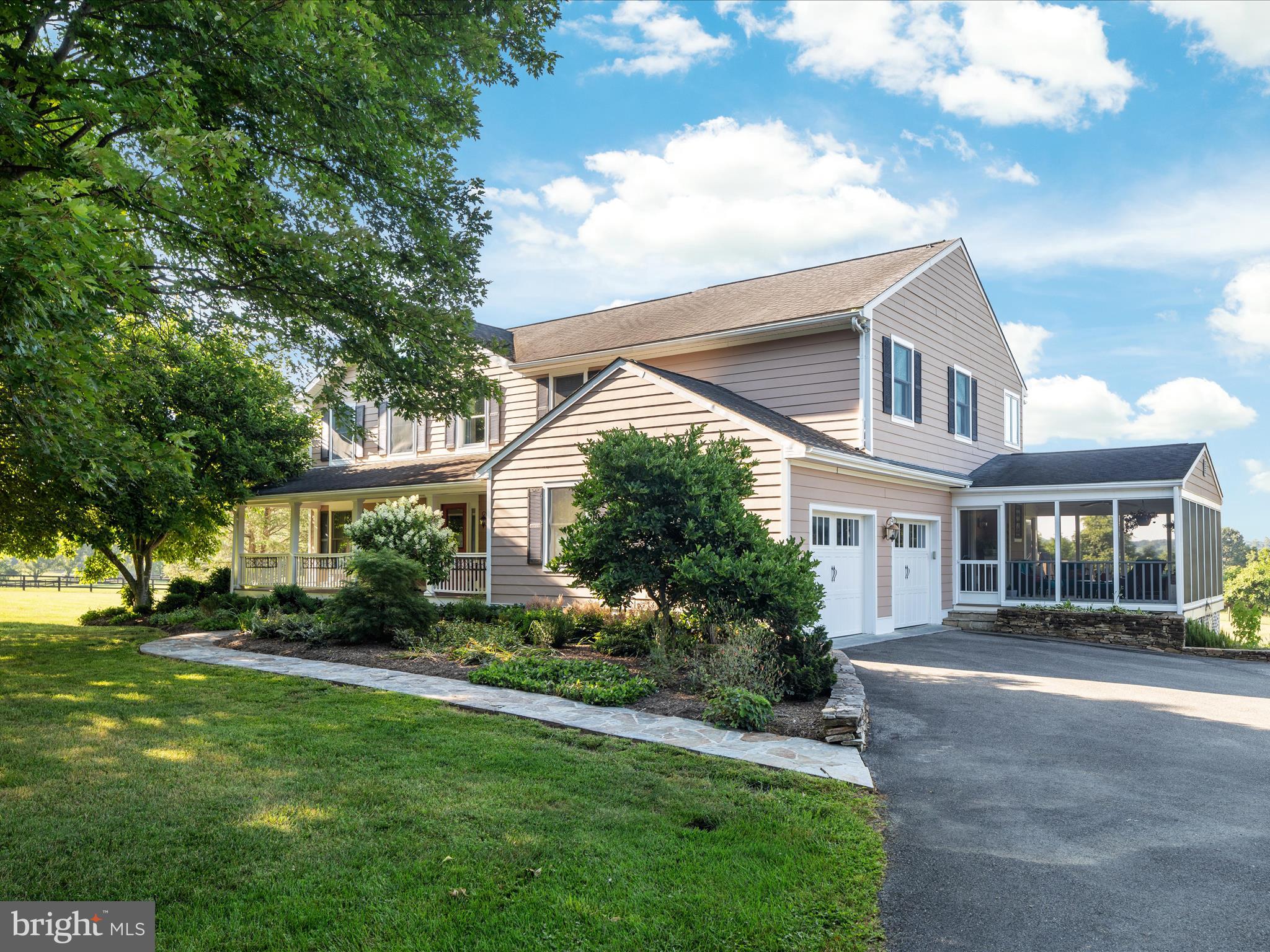 36823 Shoemaker School Road Purcellville, VA 20132 - Photo 49 of 59 a front view of house with yard and green space